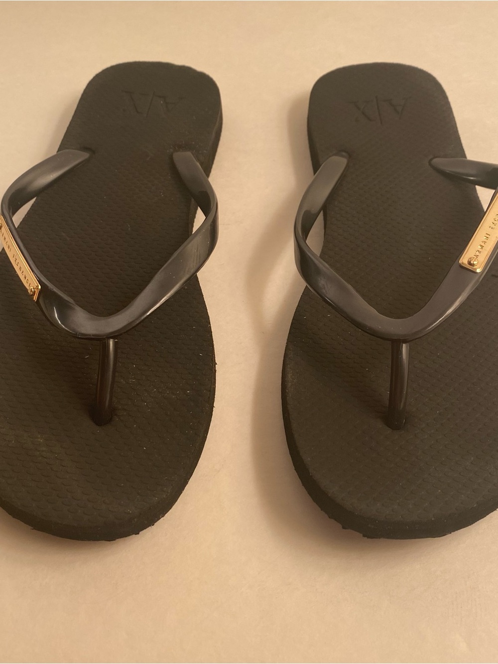 A/X Armani Exchange Black Flip Flops Size 5/6 S Like New with Gold Logo Plaque